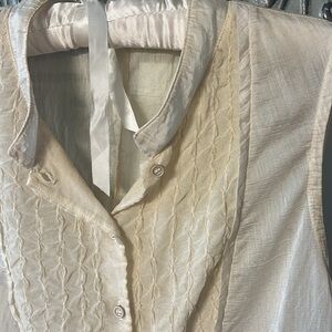 Cream tuxedo style women’s blouse